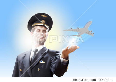 Image of pilot with plane in hand Image of pilot with plane in hand 6828920