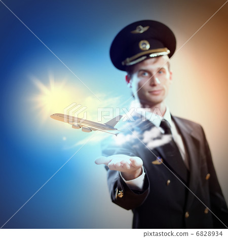 Image of pilot with plane in hand Image of pilot with plane in hand 6828934