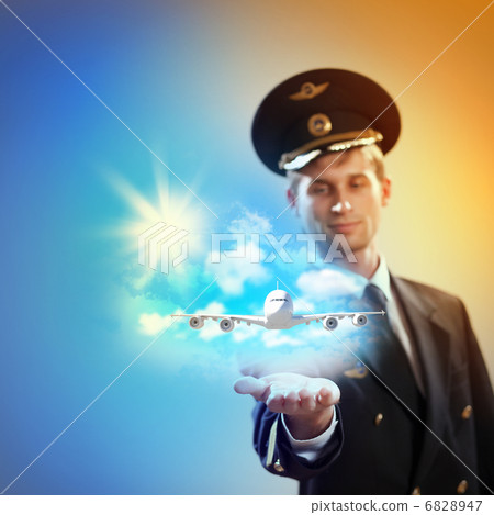 Image of pilot with plane in hand Image of pilot with plane in hand 6828947