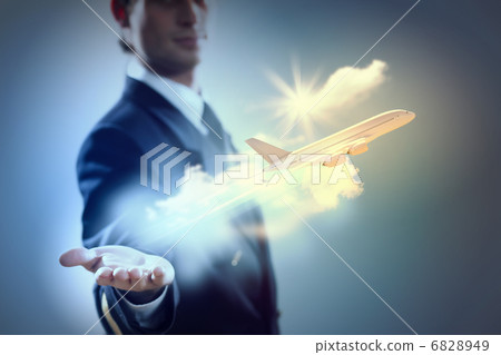 Image of pilot with plane in hand Image of pilot with plane in hand 6828949