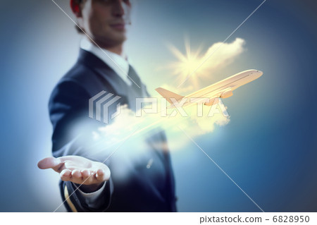 Image of pilot with plane in hand Image of pilot with plane in hand 6828950