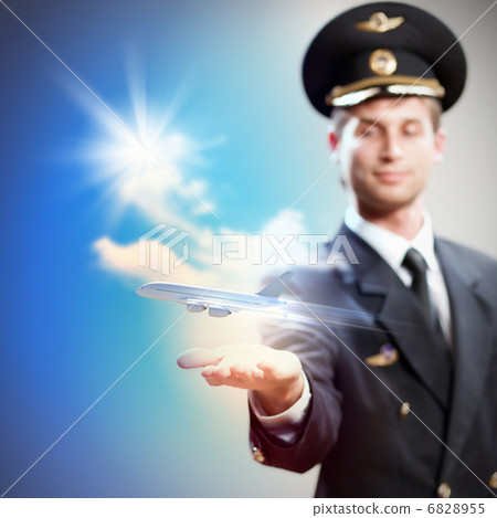 Image of pilot with plane in hand Image of pilot with plane in hand 6828955
