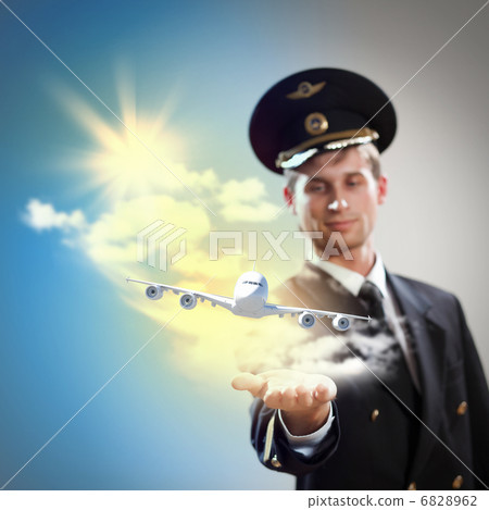 Image of pilot with plane in hand Image of pilot with plane in hand 6828962