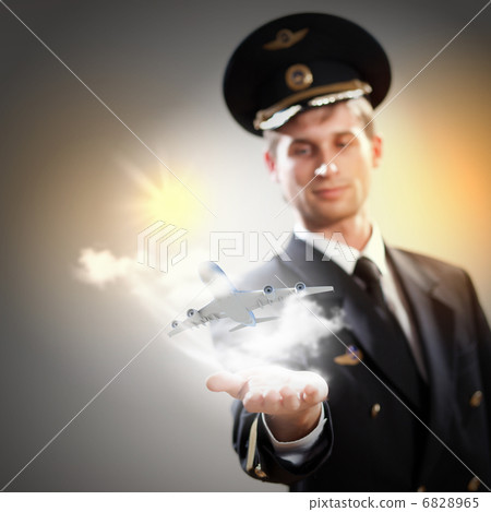 Image of pilot with plane in hand Image of pilot with plane in hand 6828965