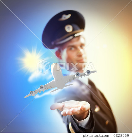 Image of pilot with plane in hand Image of pilot with plane in hand 6828969