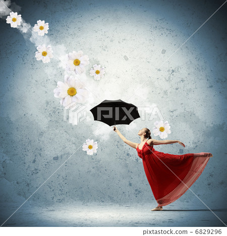 Ballet dancer in flying satin dress with umbrella Ballet dancer in flying satin dress with umbrella 6829296