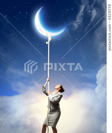 Image of businesswoman climbing the rope 6829359