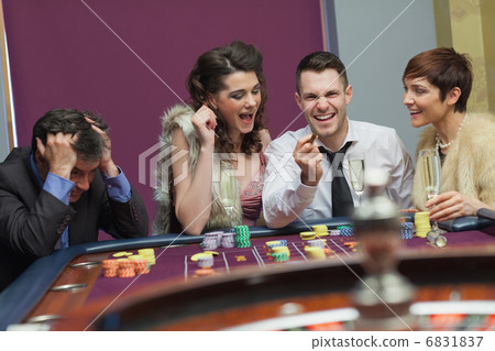 Winner and loser at roulette table Winner and loser at roulette table 6831837