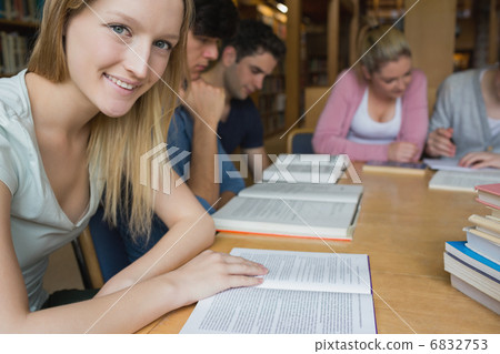 Smiling student with study group 6832753