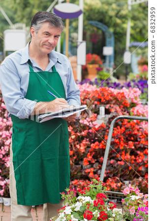 Assistant taking notes 6832959