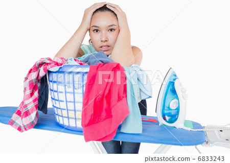 Woman fed up with ironing 6833243