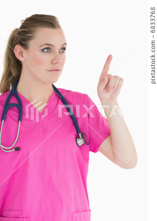 Doctor pointing to something 6833768