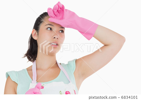 Cleaning woman looking tired 6834101