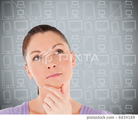 Woman looking up and thinking 6834189