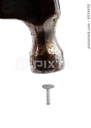 Hammer above a nail 6834450