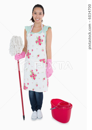 Happy woman with mop and bucket Happy woman with mop and bucket 6834700