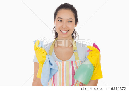 Woman holding cloth and spray bottle 6834872