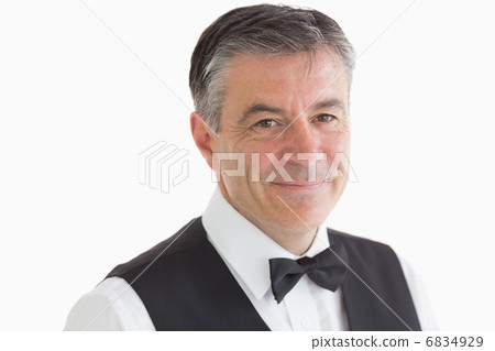 Smiling and Well-dressed waiter Smiling and Well-dressed waiter 6834929