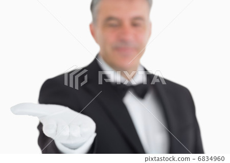 Waiter showing his opened hand Waiter showing his opened hand 6834960