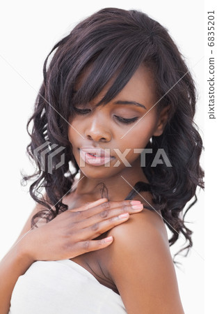Natural beauty touching shoulder Natural beauty touching shoulder 6835201