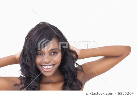 Woman hands at her hair Woman hands at her hair 6835204