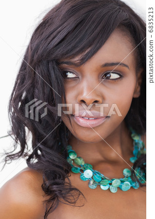 Woman smiling in blue necklace Woman smiling in blue necklace 6835213