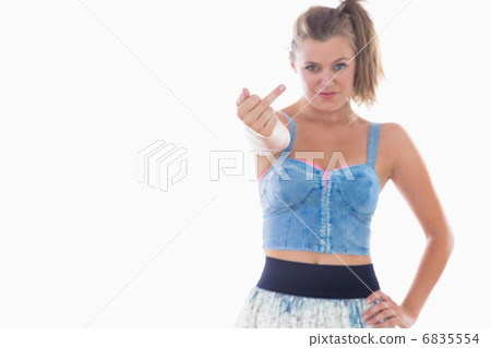 Cheeky woman showing middle finger 6835554