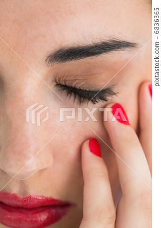 Woman with red lips touching her skin Woman with red lips touching her skin 6836365