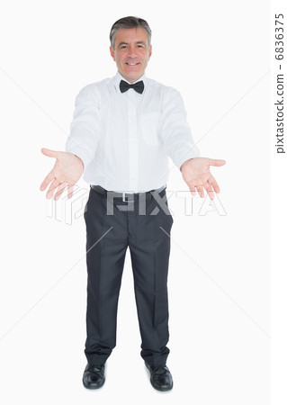 Man in a suit with open arms Man in a suit with open arms 6836375