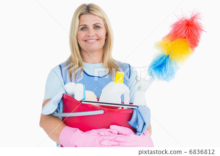 Cleaner woman holding a pink bucket with cleaning supplies 6836812