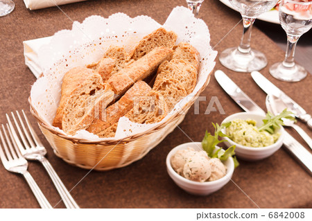fresh crusty bread in a basket 6842008