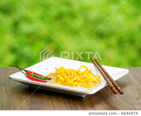 Egg noodles on nature background Egg noodles on nature background 6844974