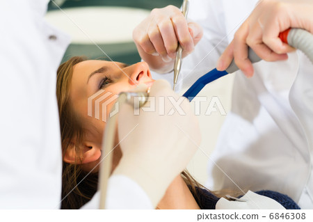 Patient with Dentist - dental treatment 6846308