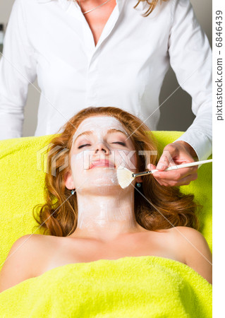 Cosmetics and Beauty - applying facial mask Cosmetics and Beauty - applying facial mask 6846439