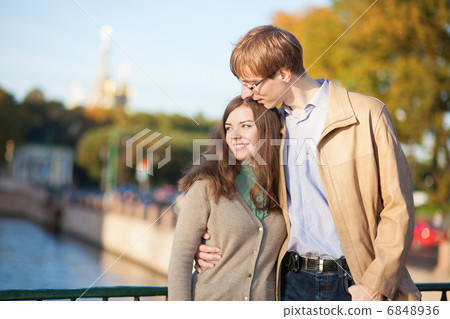 Happy young romantic couple outdoors Happy young romantic couple outdoors 6848936