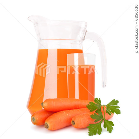 Carrot vegetable juice in glass jug 6850530