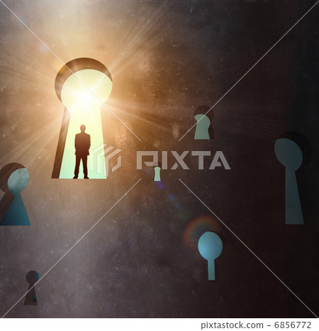 Silhouette of businessman in keyhole 6856772