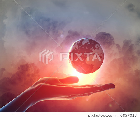 Image of earth planet on hand 6857023