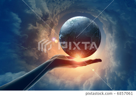 Image of earth planet on hand 6857061