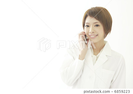 Doctor or pharmacist speaking on mobile phone or researcher Doctor or pharmacist speaking on mobile phone or researcher 6859223