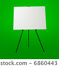 Blank Canvas on Easel Stand. Art Studio Empty Background 6860443