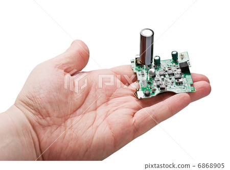 printed circuit board in a hand 6868905