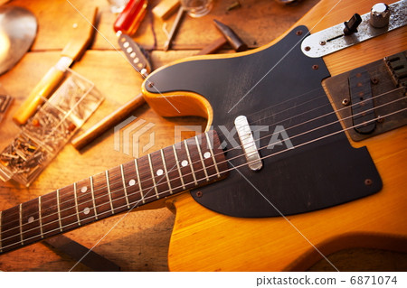 Electric guitar on the workbench. Guitar repair 6871074