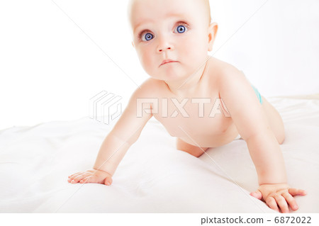 interested child on white fabric interested child on white fabric 6872022