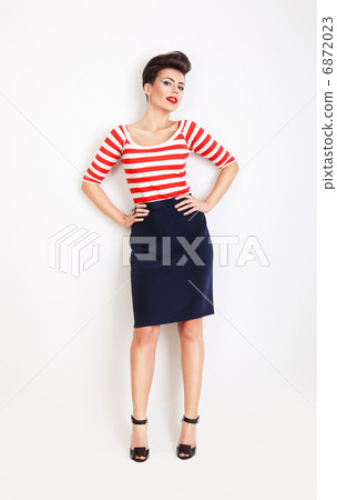 cute pretty woman in t-shirt and skirt 6872023