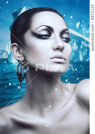 portrait of brunette winter woman with diamond earring portrait of brunette winter woman with diamond earring 6872125