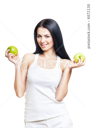happy woman with two applea in hands happy woman with two applea in hands 6872130