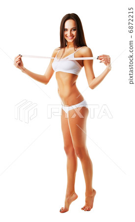 Healthy sporty pretty woman with white measure Healthy sporty pretty woman with white measure 6872215