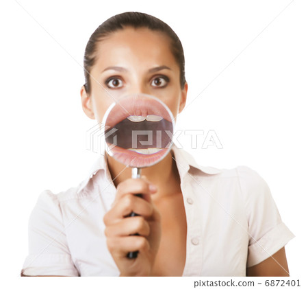 business woman with magnifying glass on mouth 6872401