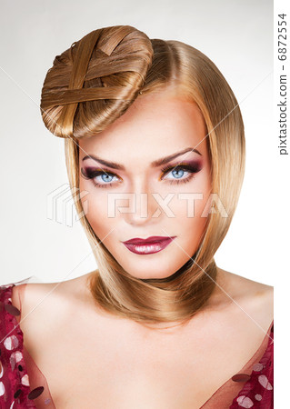 blond woman with beautiful blue eyes and hair around neck blond woman with beautiful blue eyes and hair around neck 6872554